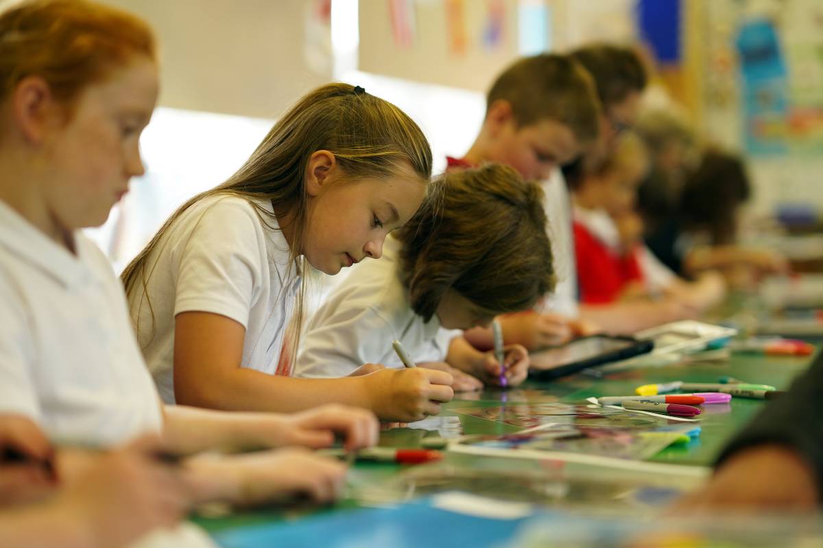 Children work on the Durham Lumiere 2019 Friendship Tree artwork